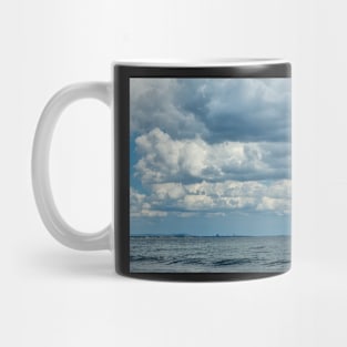 Cloudy weather over the ocean Mug